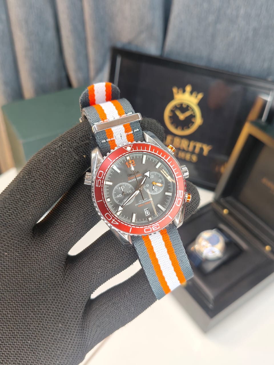 Omegaa Seamasterr Planet Ocean 600M 45.5 mm, steel on NATO strap Grey Orange